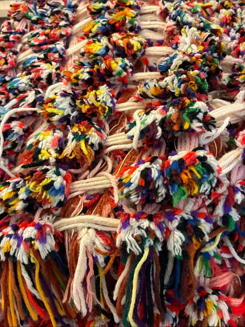 Unique Woven Pom Pom and weave multicolored yarn throw blanket. Hand made. 5’x5